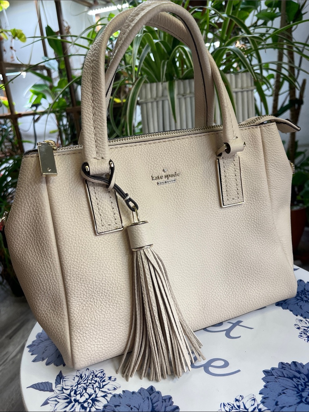 kate spade Pebbled Leather Satchel in Light Cream with Tassel